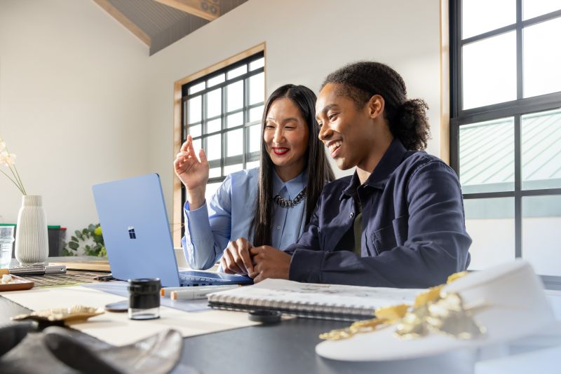 Photo of employees working together