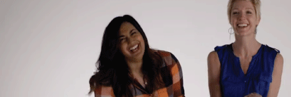 Two employees laughing.