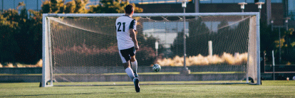 Employee playing soccer.