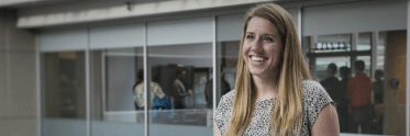 Employee smiling in office.