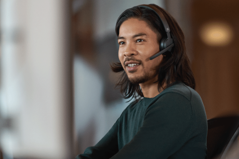 Employee speaking with a headset.