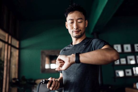 Photo of employee looking at smartwatch
